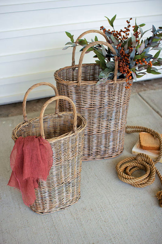 Set of two tall oval wicker baskets by Kalalou