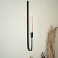 Forged-iron single taper wall sconce by Kalalou